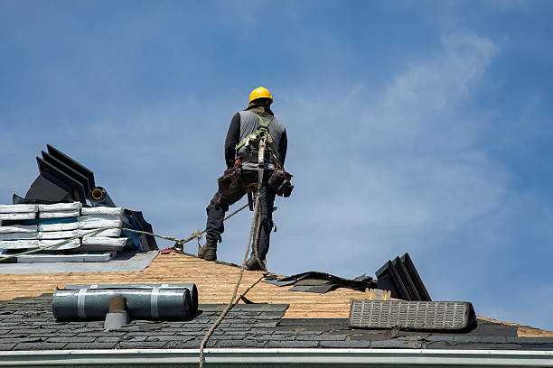 Professional Roof Replacement technician working in Locke, NY